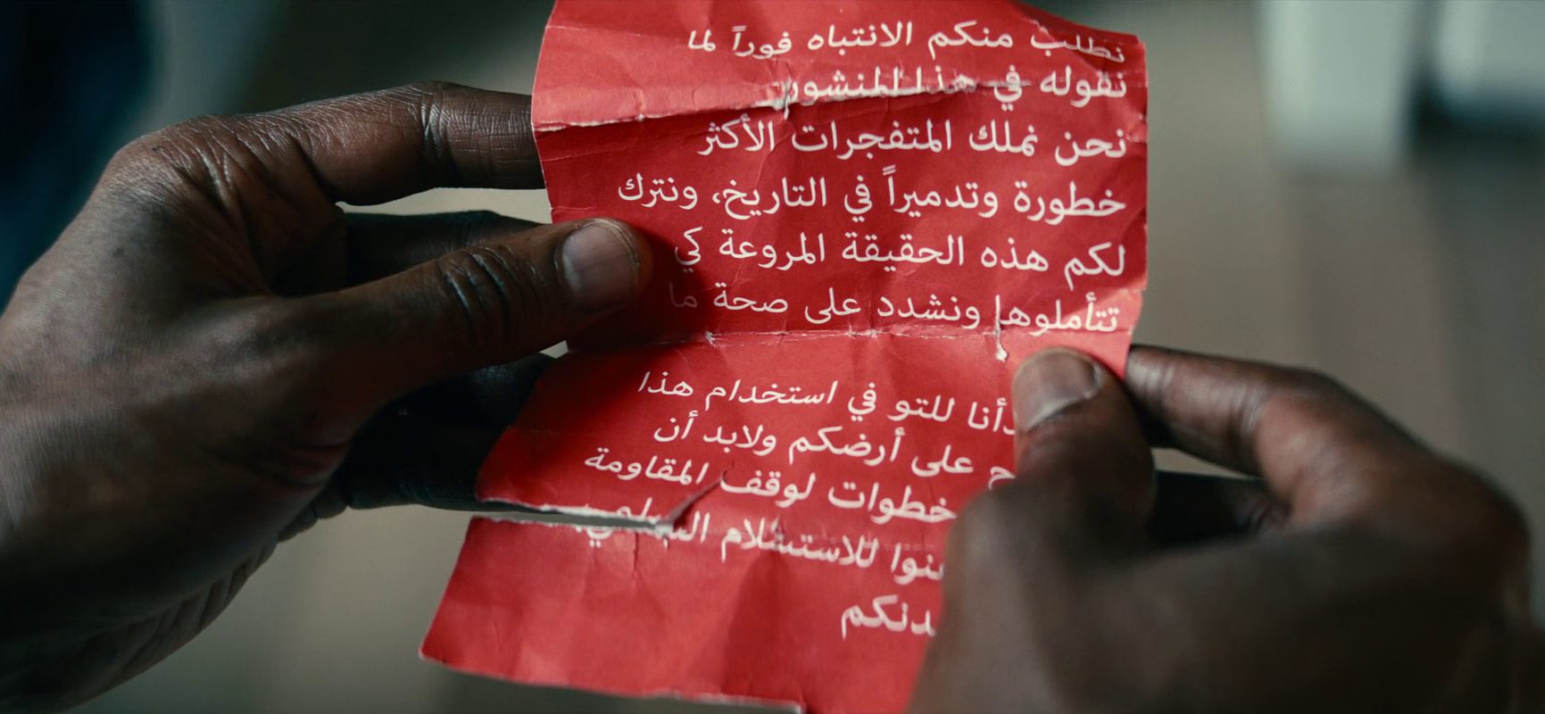 Who Drops the Death to America Leaflets in Leave the World Behind?